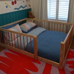 Picture of bed base on the floor with dowel rails